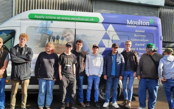 Students in front of mini bus