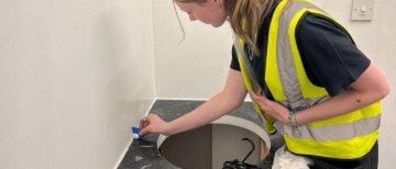 Moulton College student fitting sink units