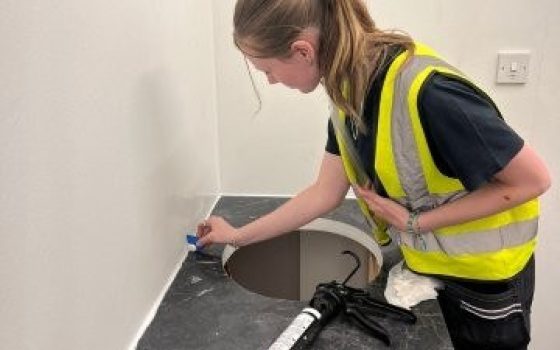 Moulton College student fitting sink units