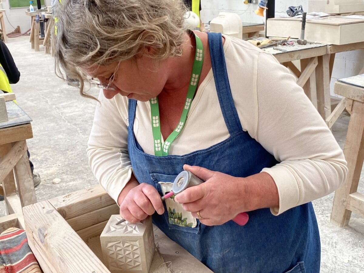 Stonemasonry student, Louise Regan working on presentation gift