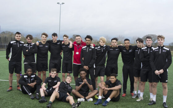 Tim Dudding Head of Football at Moulton College with Academy players