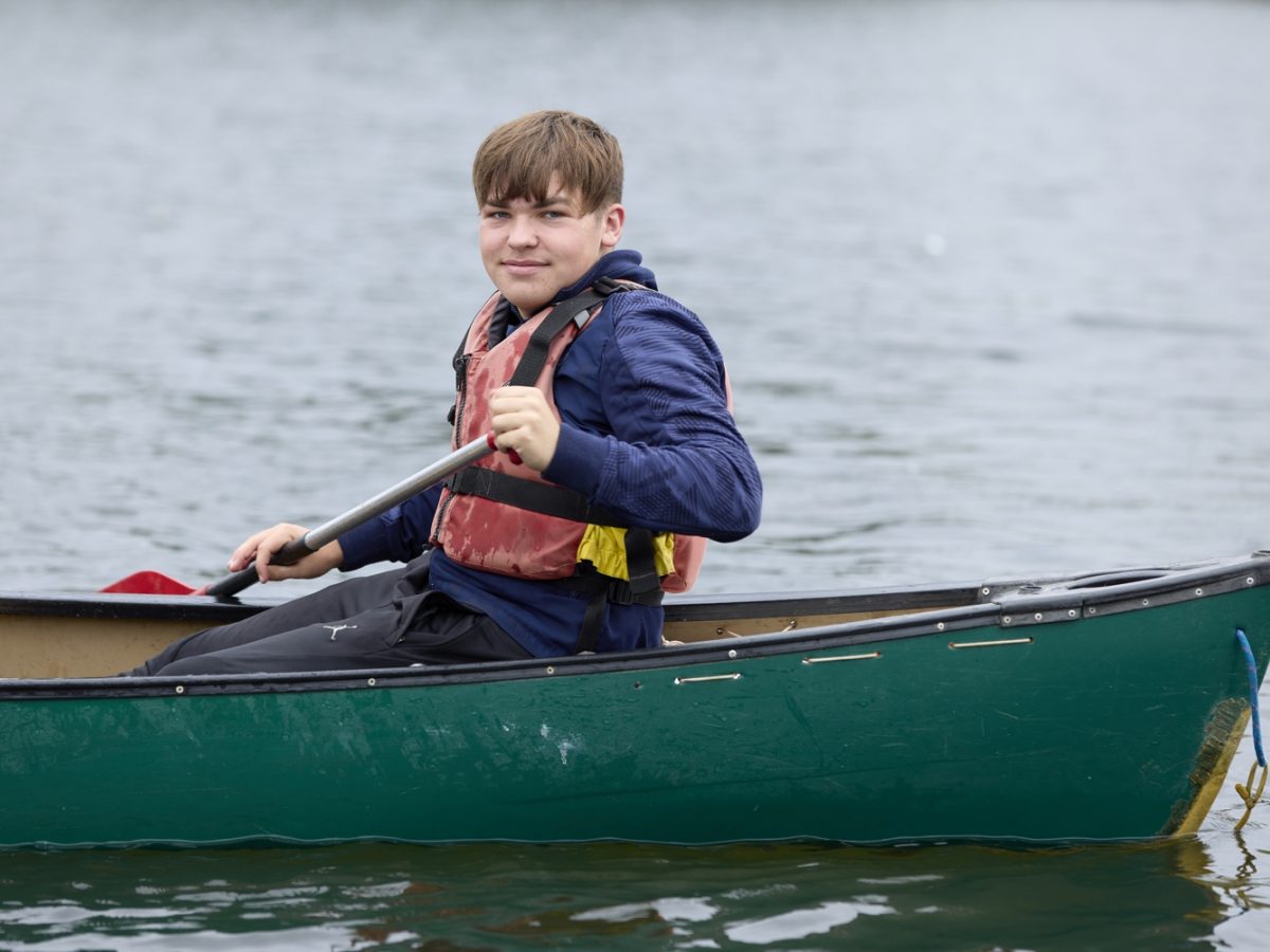 Student canoeing at Caldecotte Xperience trip