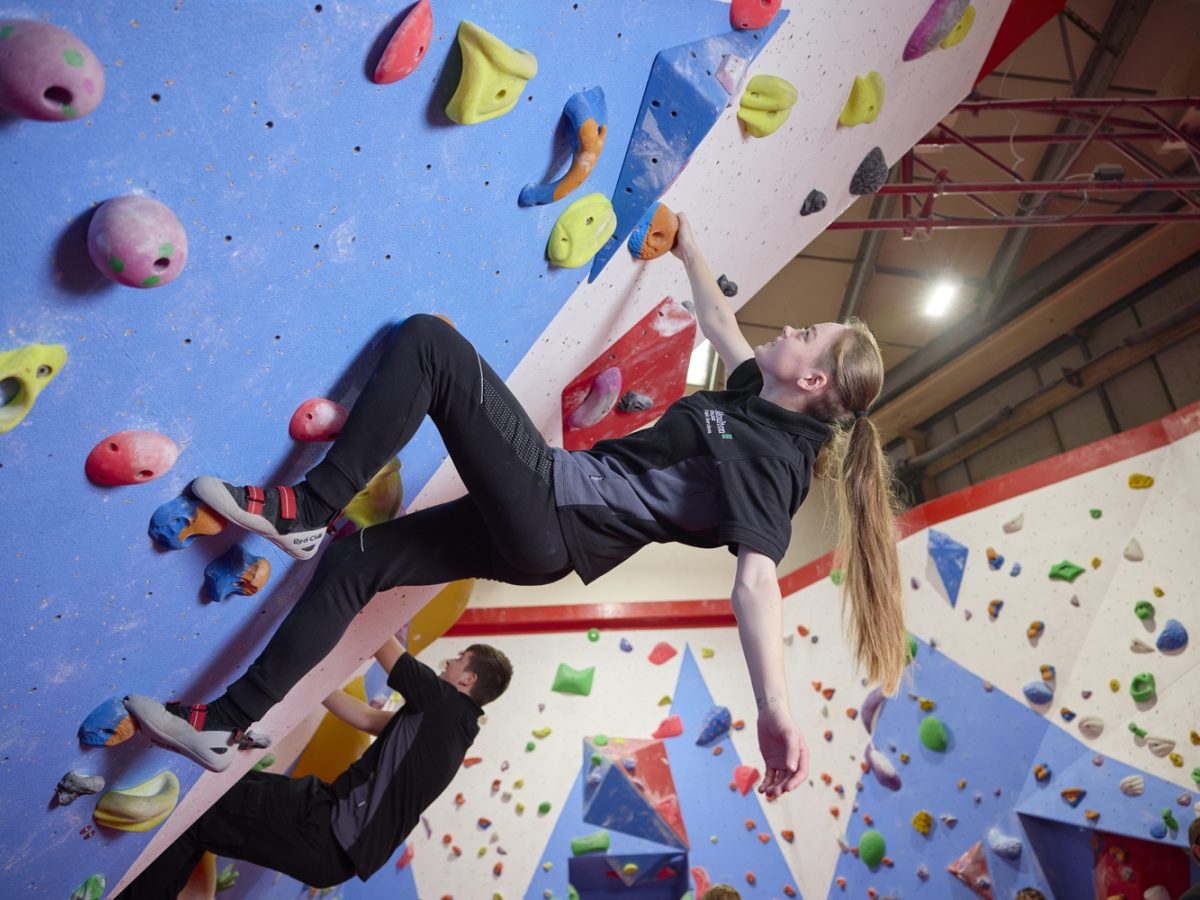 Student rock climbing