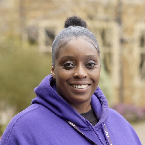 Careers Advisor smiling wearing a purple moulton hoodie