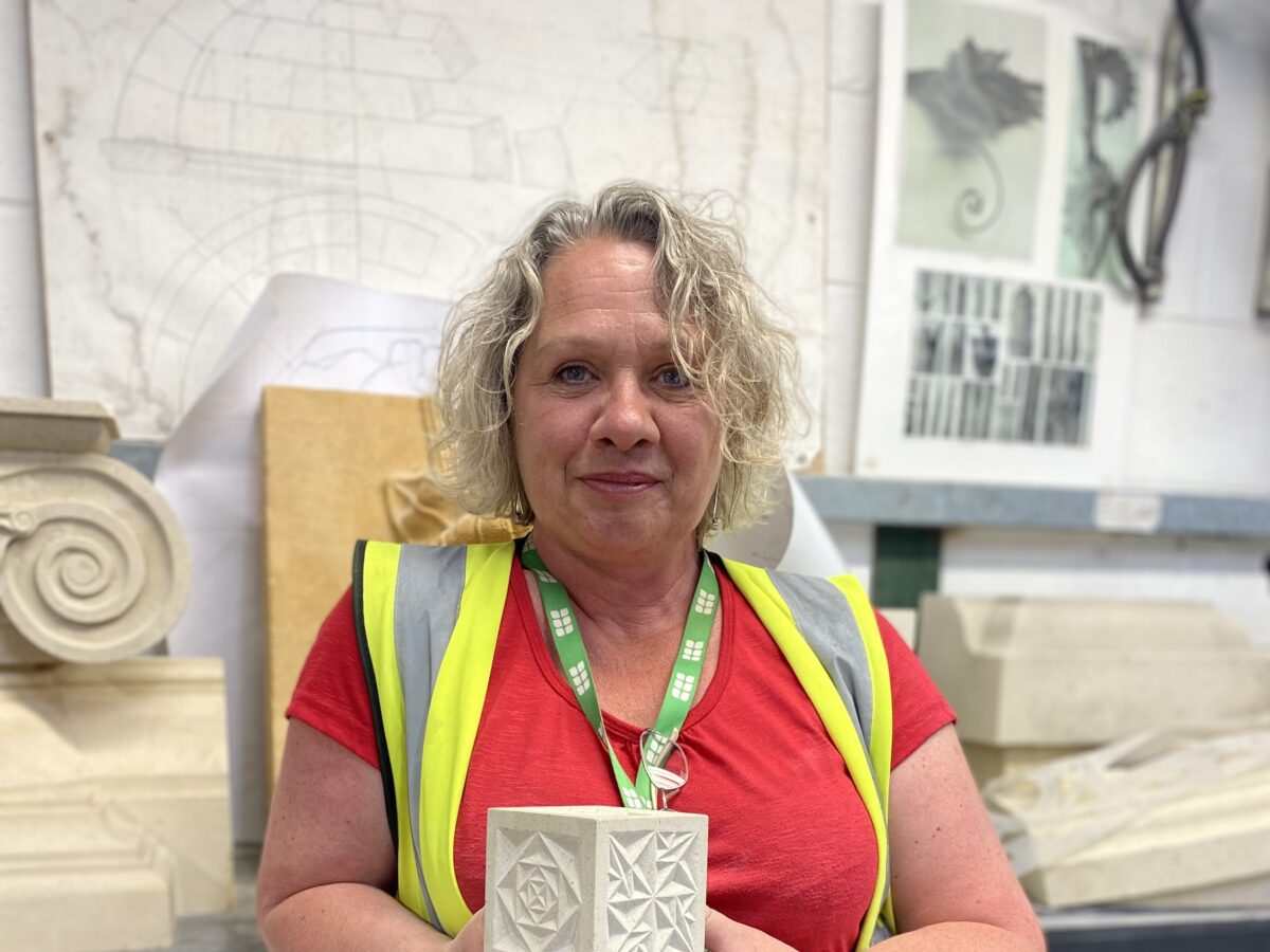 Louise Regan with the stone paperweight she carved for HRH The Duke of Gloucester