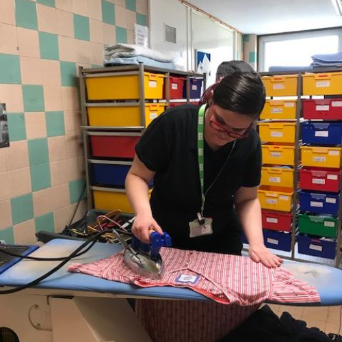 Bethany foundation learning student ironing