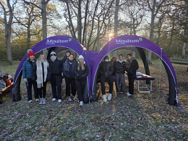 Sports Massage students under inflatable gazebo with massage beds