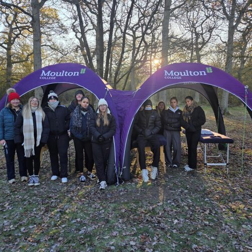 Sports Massage students under inflatable gazebo with massage beds
