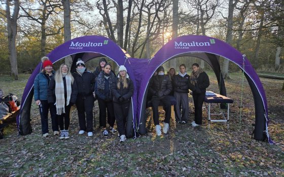 Sports Massage students under inflatable gazebo with massage beds